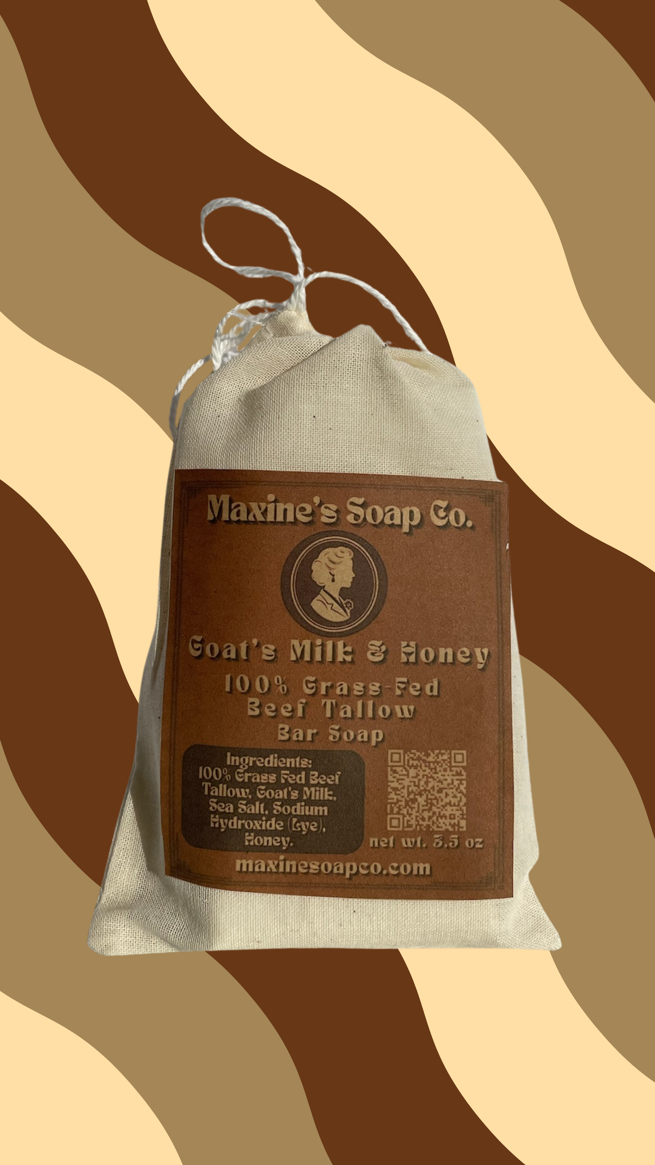 Goats milk and honey 100% grass-fed beef tallow bar soap 3.5oz in muslin bag showing ingredients tallow goats milk sea salt honey. Maxine's Soap Co.