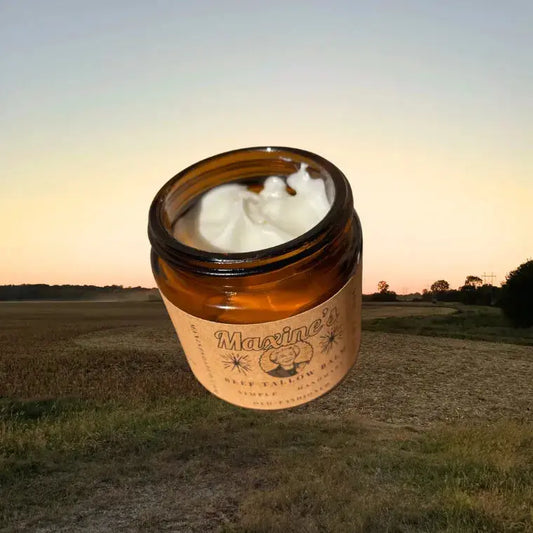 Close-up of balm texture in tin. Small-batch beef tallow with olive oil and calendula for straightforward everyday use.