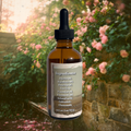 Cleansing face oil 4oz amber glass dropper bottle angled view