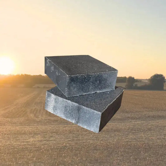 Unwrapped coconut oil bar soap with charcoal, small-batch and simply made with a short ingredient list.