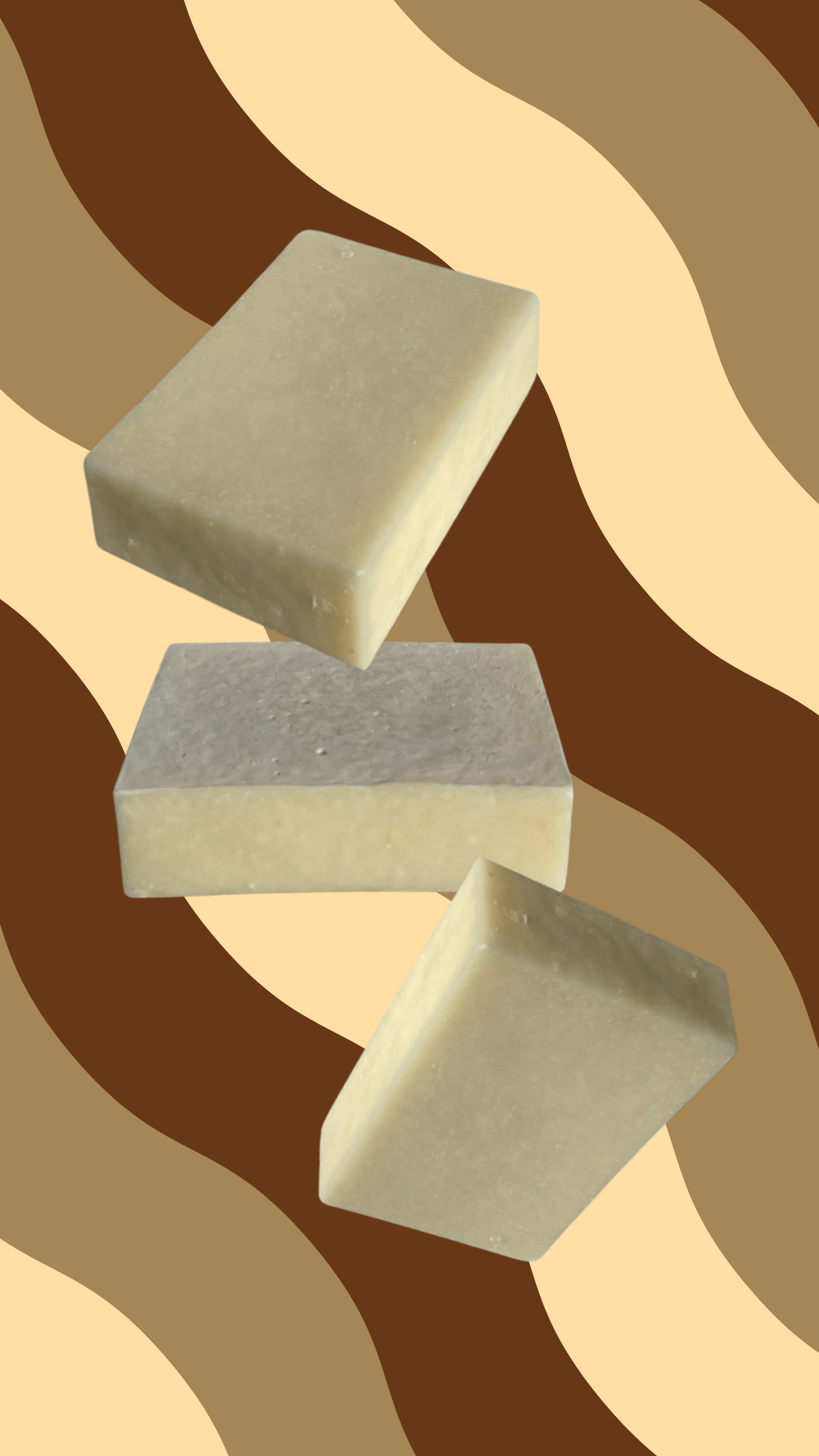 Goats milk and honey beef tallow soap bars showing natural creamy color and handmade texture. Maxine's Soap Co.