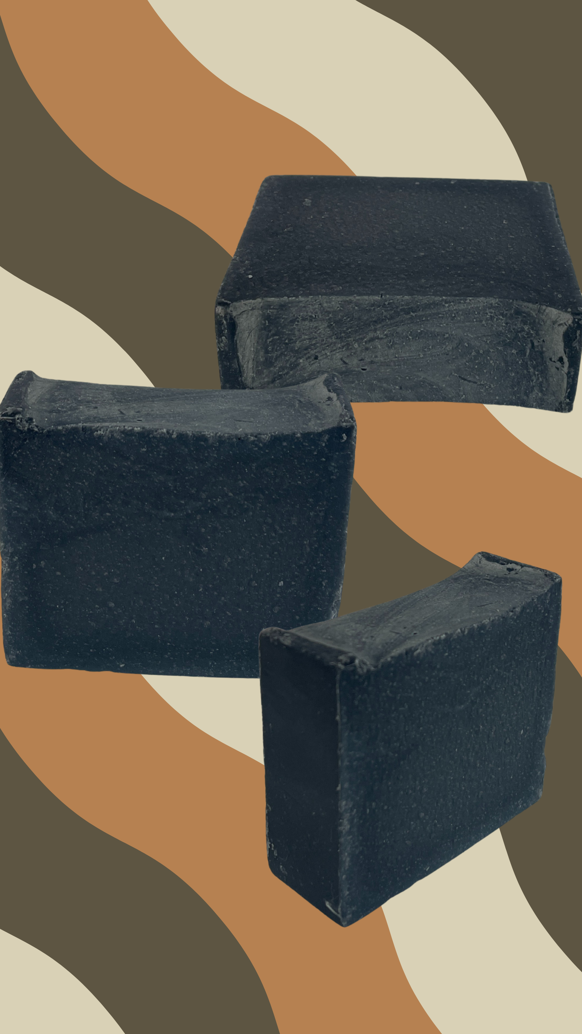 Maxine's beef tallow charcoal soap bars displayed at different angles showing black charcoal detox formula